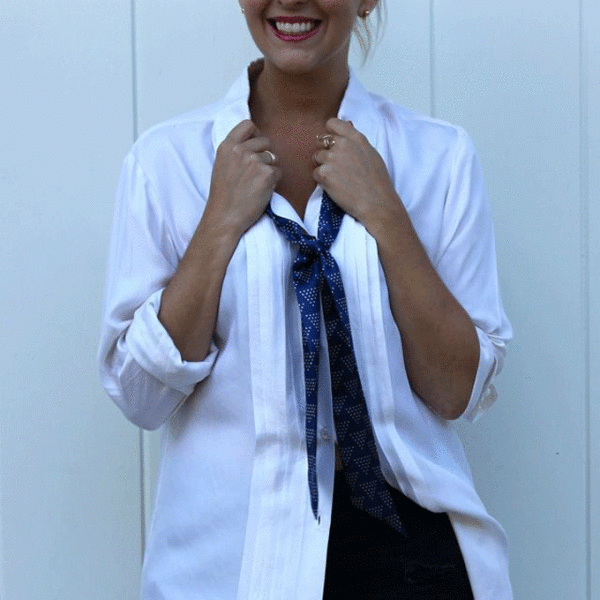 Wrap a loose "lady tie" around your white shirt for a classic look. Photo courtesy of Racked.com.