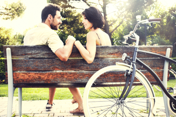 couple-park-bench-bike